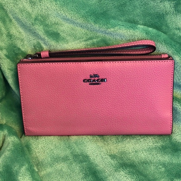 Coach Handbags - Coach pebbled leather wallet with wrist strap.
